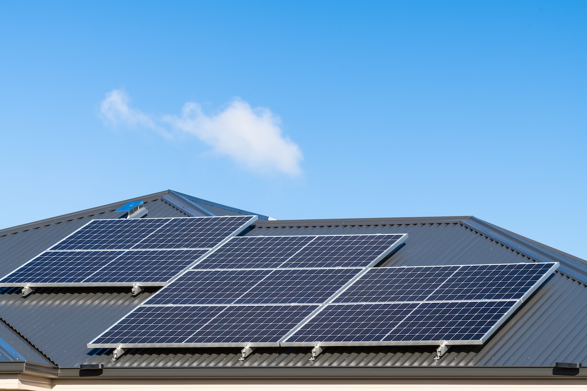 New solar panels installed on metal sheet roof of the house in South Australia