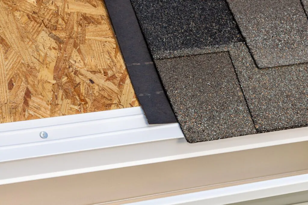 drip edge Cutaway view of house roof building materials. Roofing construction, repair and building codes concept.