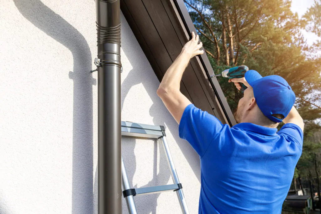 metal roof repair roofer installing metal roof drip edge profile