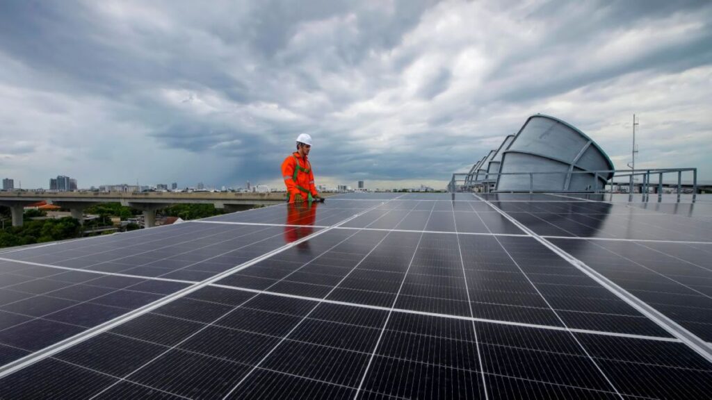 Flat roof solar installation business building