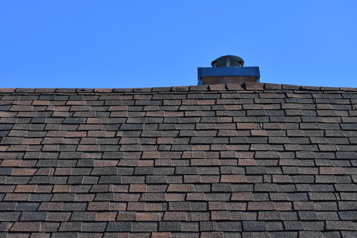 Roof with classic three tab shingles.