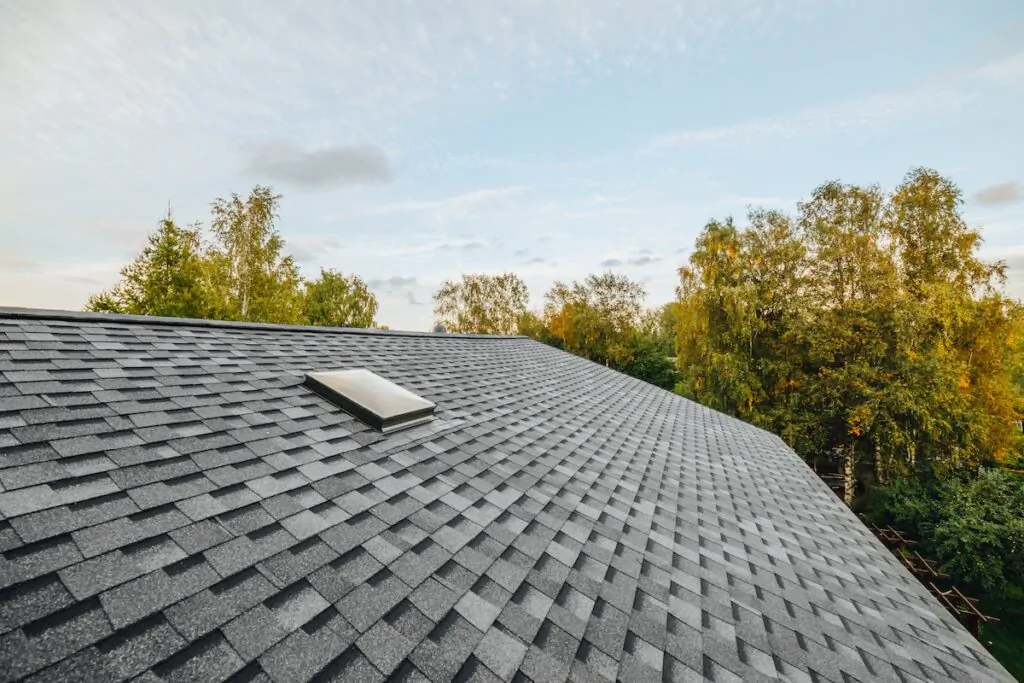 roofing companies in peoria il new renovated roof covered with shingles flat polymeric roof-tiles