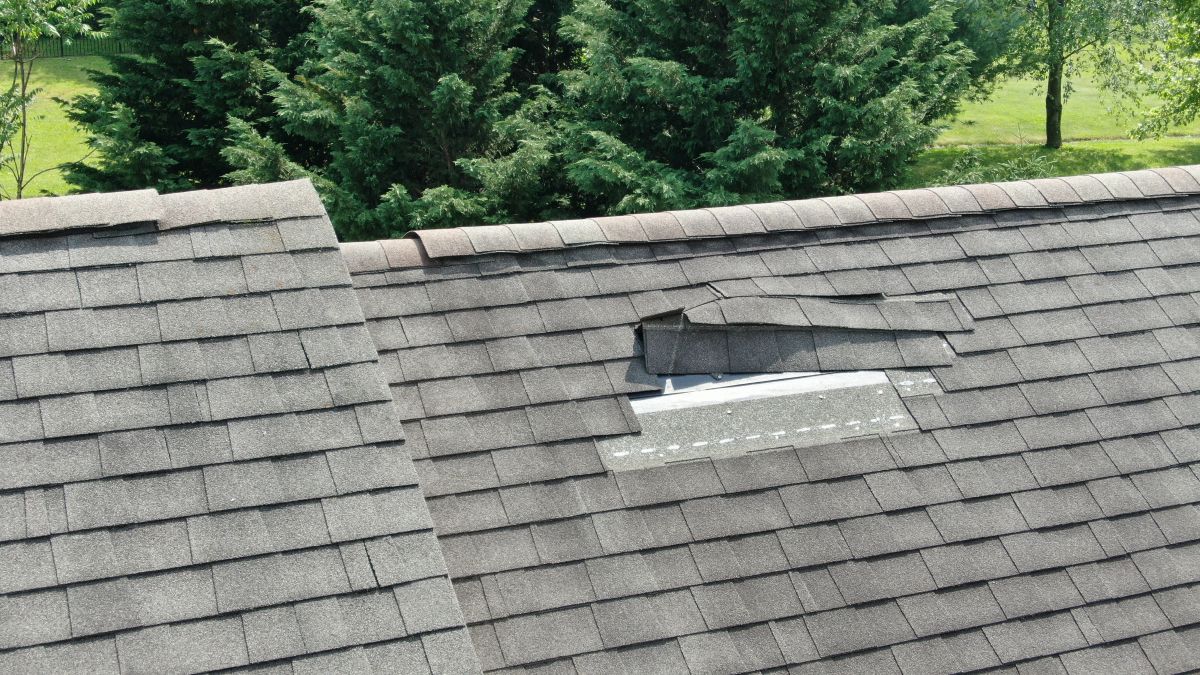 Aerial Drone Close Up of Roof Damage, Missing Shingles