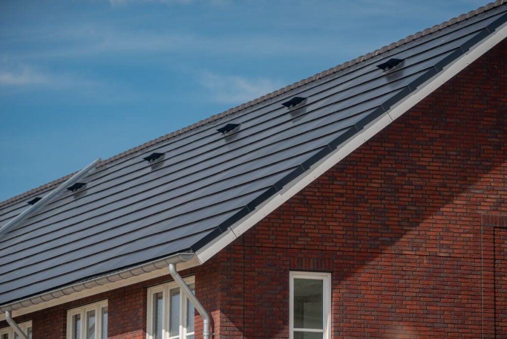 High-tech solar roof tiles on roof
