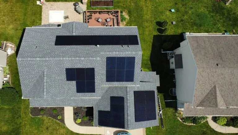 Aerial view of a roof with solar panels