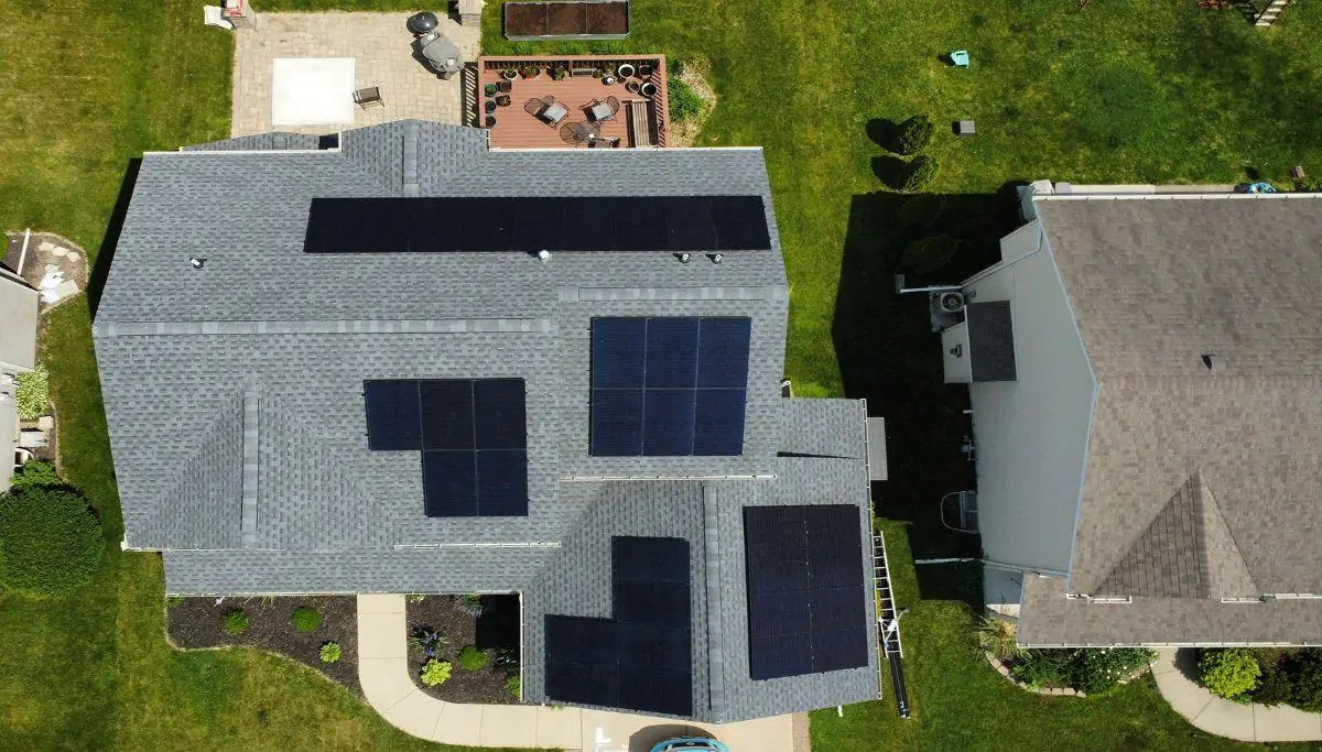 Aerial view of a roof with solar panels